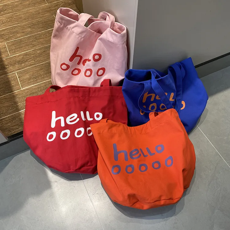 超大号新款字母水桶大包包帆布撞色韩版简约托特包购物袋单肩包