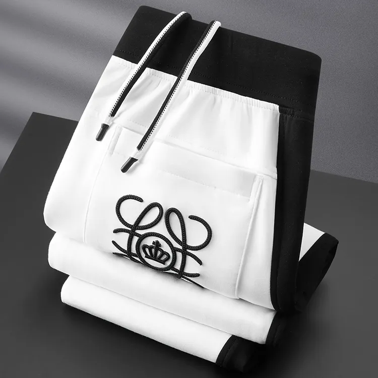 轻奢级春夏季薄款莫代尔白色裤子男修身束脚刺绣拼接休闲运动裤男