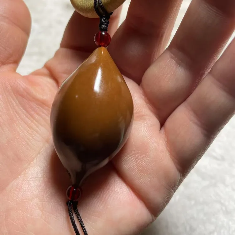 巴西橄榄核光珠素核手把件带竹环穿配