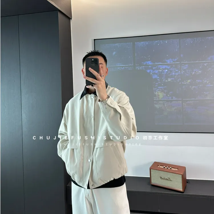 CHUJIE韩版时尚休闲微宽松纯色结构设计编制PU皮翻领夹克外套
