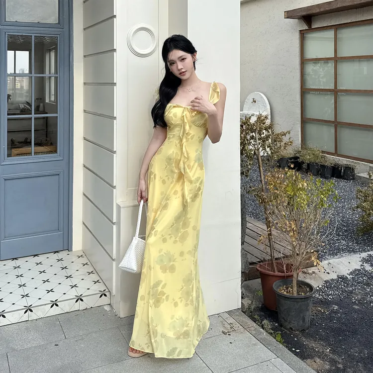 小可WIWI裙子女款爆款2025新款高级感奶油黄法式荷叶边印花连衣裙