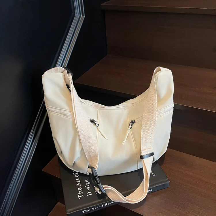 日韩高颜值网红包包女大容量布包斜挎包饺子包单肩百搭休闲户外包