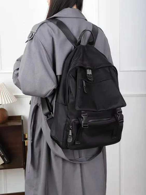 2025新款牛津布时尚黑色双肩包休闲大容量百搭防水布男女通用背包