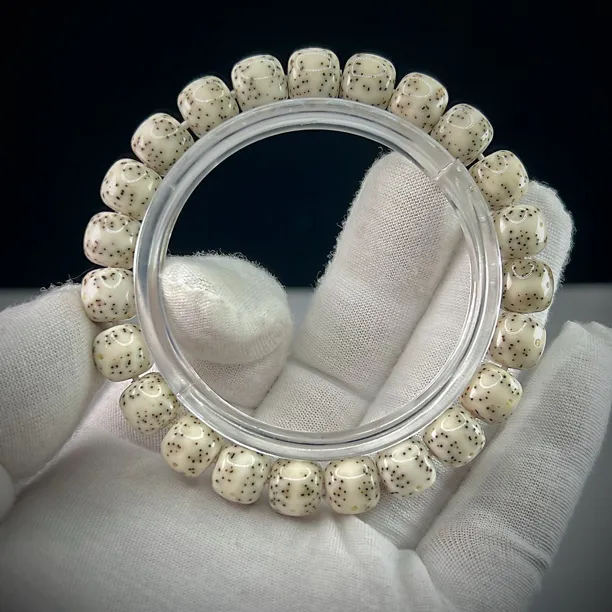 海南星月菩提 毕业高货石玉料10×9骨瓷白一线天留白