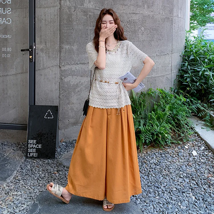 大方得体穿搭一整套2025夏季亮片拼接镂空针织上衣阔腿裤两件套装