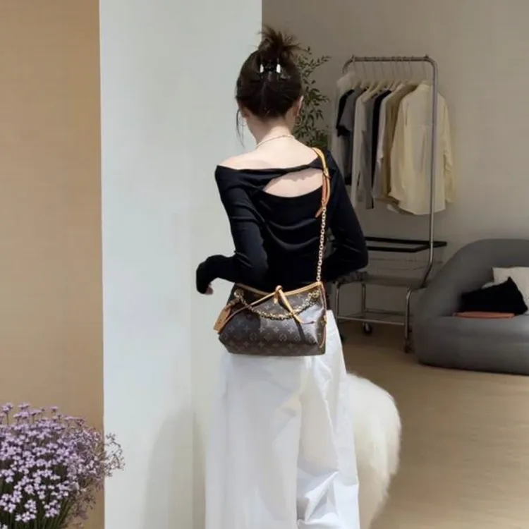 黑色不规则一字领露肩长袖T恤女秋季修身后背镂空设计感小众上衣