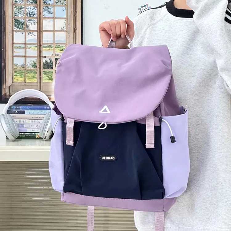 学生洋气新款2025简约双肩包女休闲个性纯色小众设计韩国风背包潮