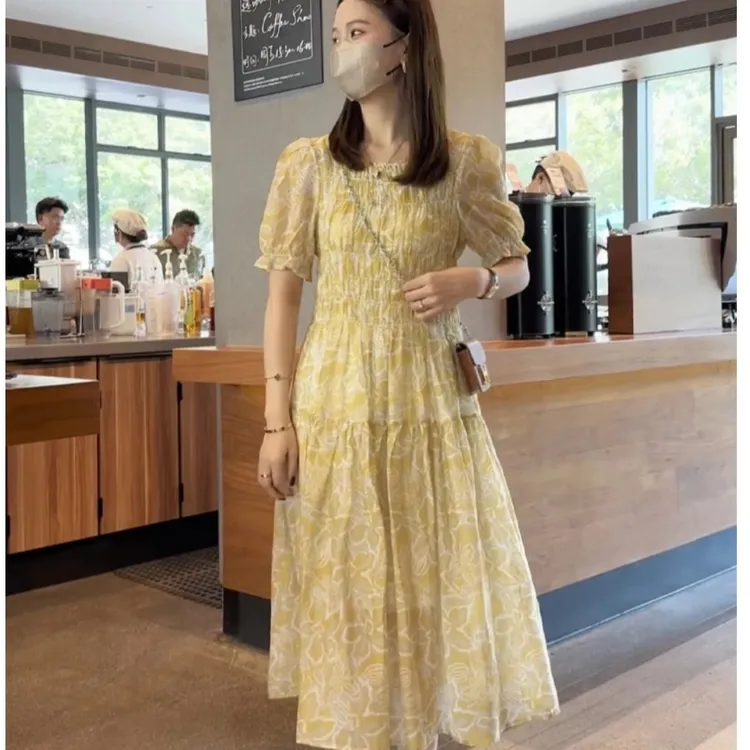 法式时尚泡泡袖黄色碎花连衣裙女2025夏季新款气质打揽显瘦中长裙