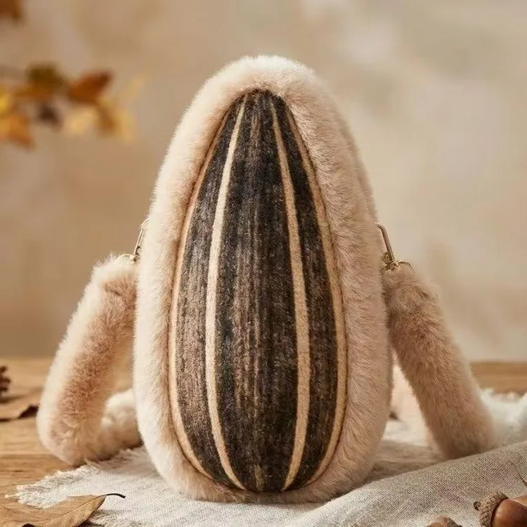 2026新款可爱毛绒巨型瓜子斜挎包个性创意包秋冬保暖时尚包包