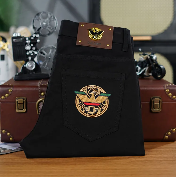 大鹰纯黑色高端轻奢牛仔裤高弹刺绣男士款裤子男款秋冬款直筒裤