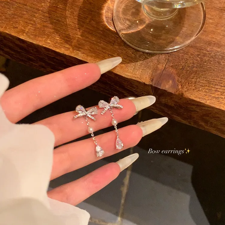 芒果饰品 铜合金锆石耳饰 秋冬蝴蝶结水滴流苏耳环女气质耳针耳饰