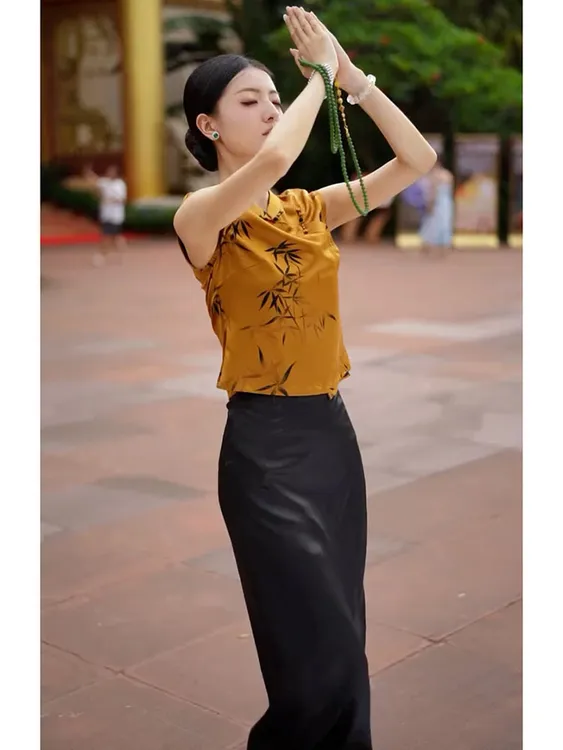 今年流行新中式国风茶里茶气别致上衣轻奢高级感黄色印花衬衫女秋