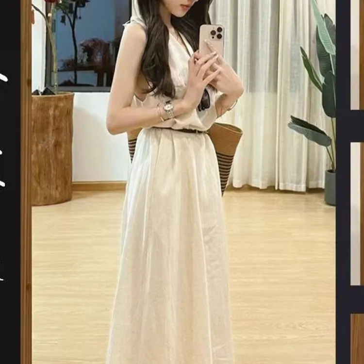 飞飞袖法式杏色v领挂脖无袖连衣裙女春季2025年波嬉风漂亮独特修