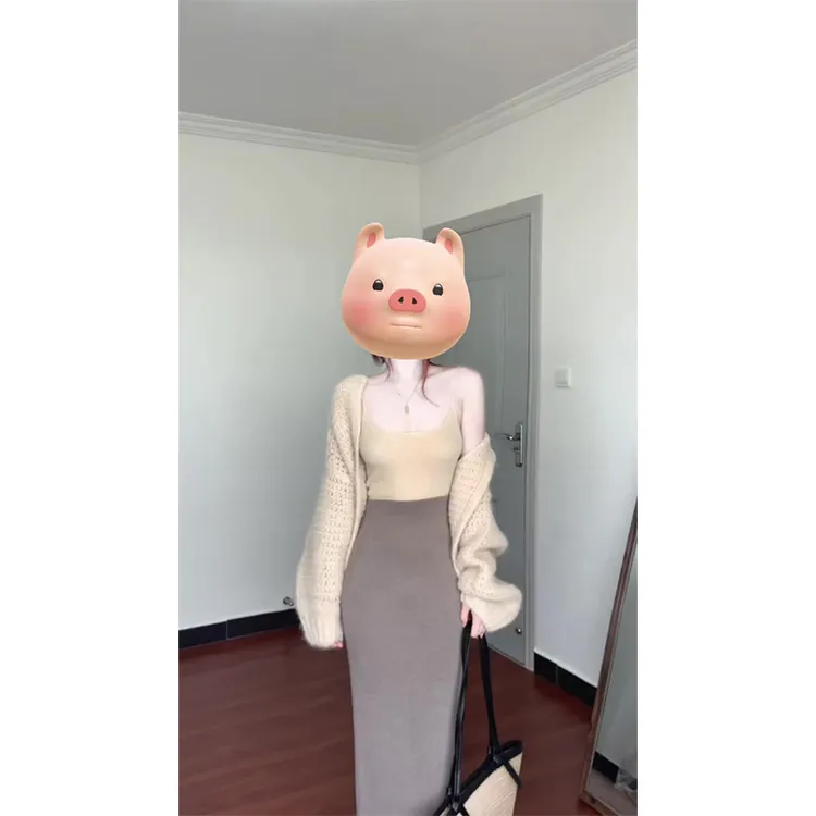 纯欲慵懒风奶茶色针织开衫女早秋季新款韩系宽松吊带外套+包臀裙