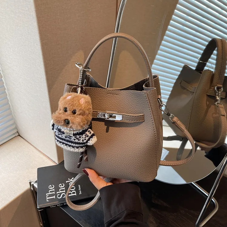 佐猫包包女款爆款2025新款水桶包大容量包包单肩包手提包通勤女包