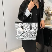 涂鸦帆布包包女2025新款休闲单肩包百搭大容量学生上课通勤托特包