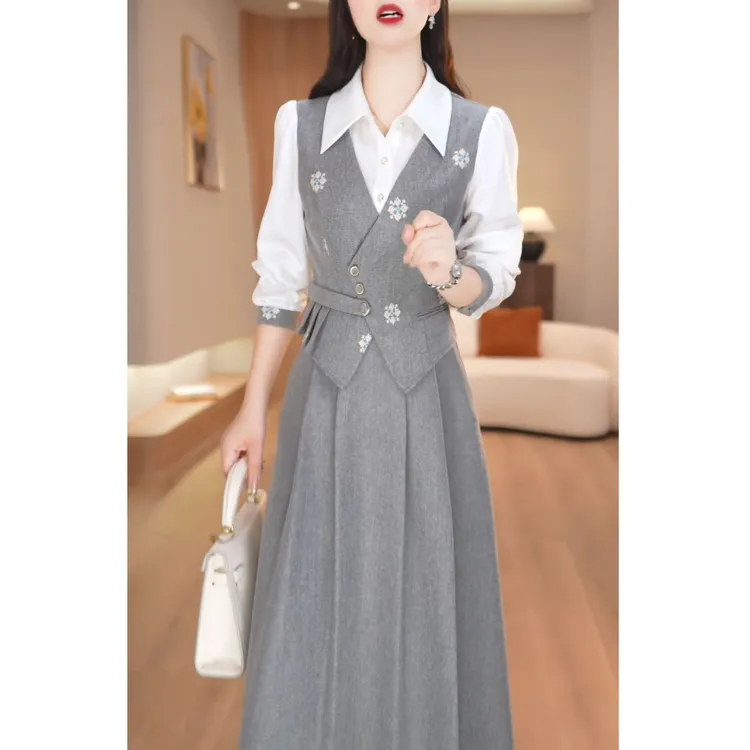 韩版小众马甲拼接连衣裙女2025秋季新款小香风印花过膝A字显瘦裙