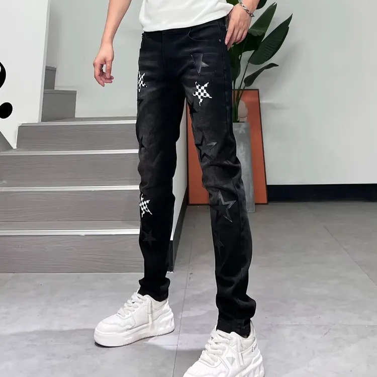设计款美式休闲牛仔裤男修身小直筒秋冬季新款时尚五角星贴皮长裤