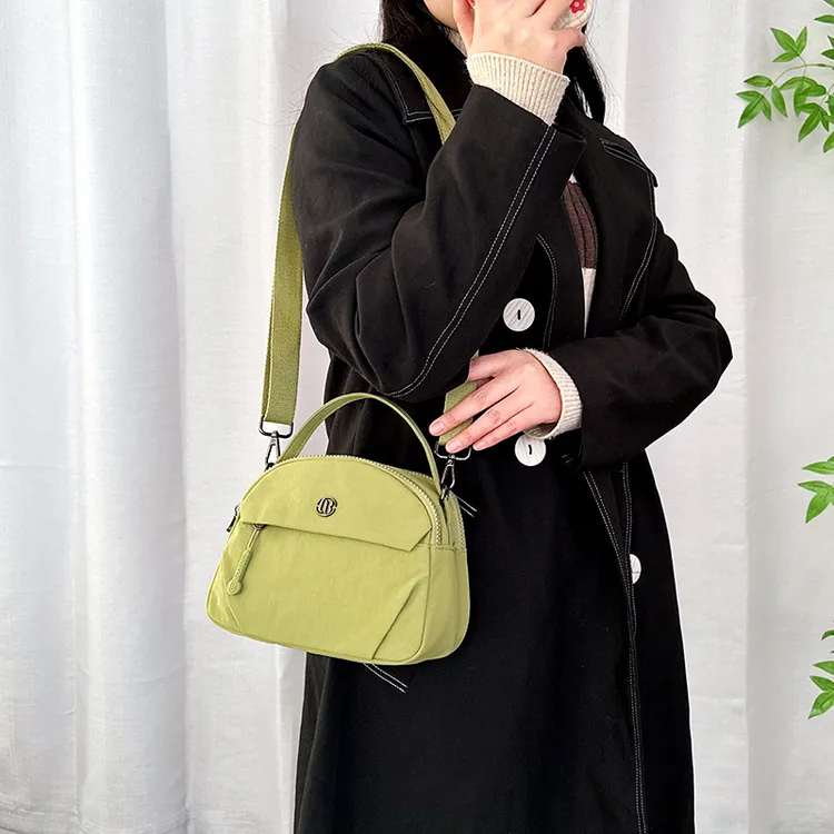 手拎小包包女牛津布2025年新款百搭休闲女士单肩包轻便斜挎帆布包