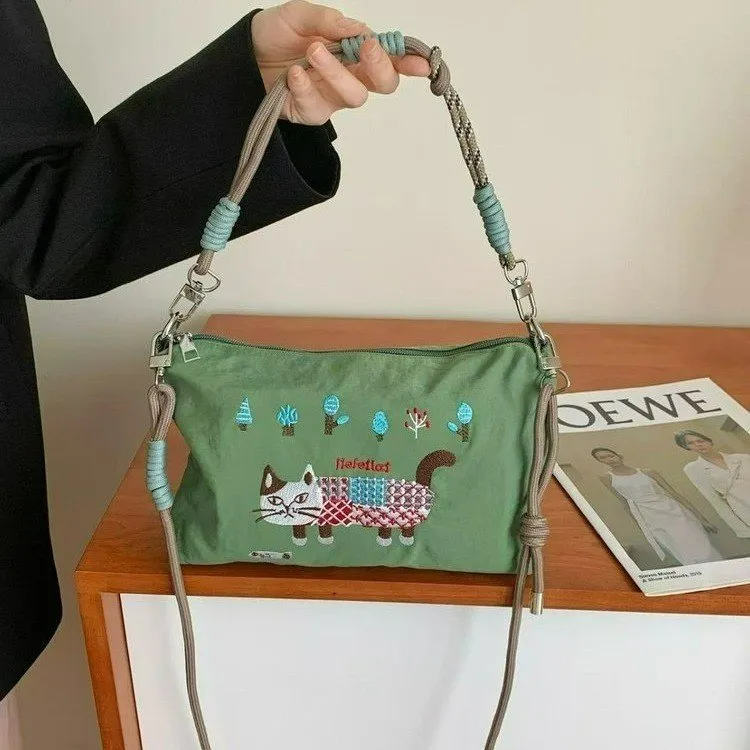 刺绣猫咪手提尼龙布包包女日系休闲外出通勤斜挎包百搭单肩包