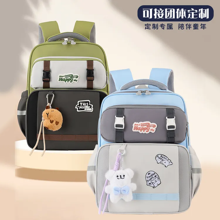 2025新款小学生书包1--3年级护脊减负双肩背包轻便防水作业收纳包