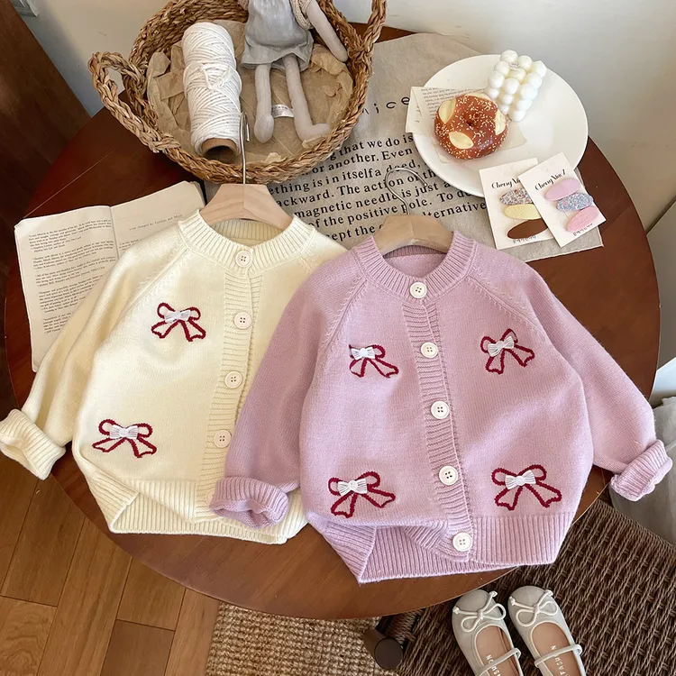 2025秋冬新款蝴蝶结珍珠针织开衫毛衣外套薄款女童甜美上衣韩系潮