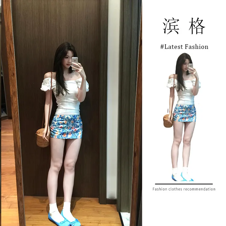 辣妹时尚套装女2025夏季设计感白色一字肩修身上衣碎花包臀短裙子