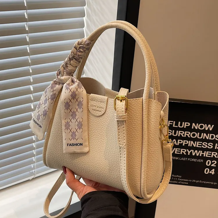 荔枝纹水桶手提女包2024新款小众菜篮子包单肩百搭女包腋下斜挎包