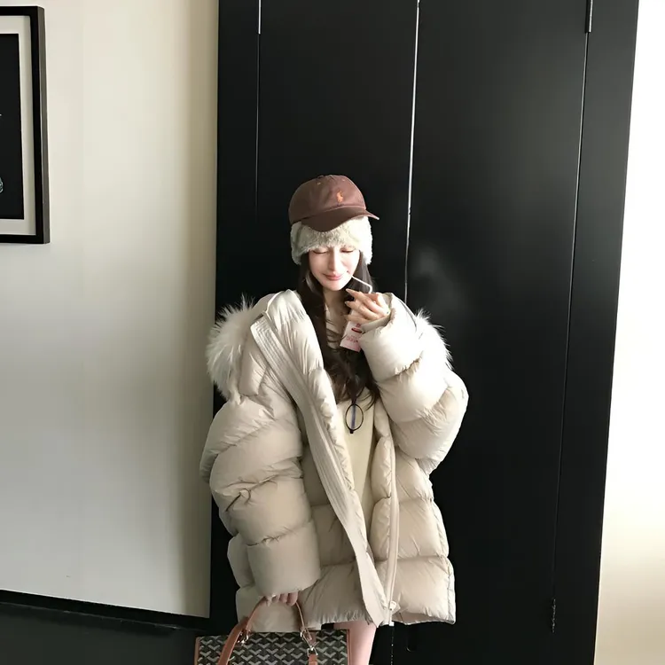 "云朵大被子"防泼水超蓬松0压感 进口貉子毛领安心95白绒绒服