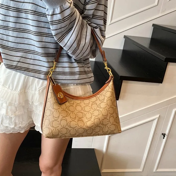 今年流行复古托特包包女2025新款通勤百搭单肩时尚斜挎水桶包