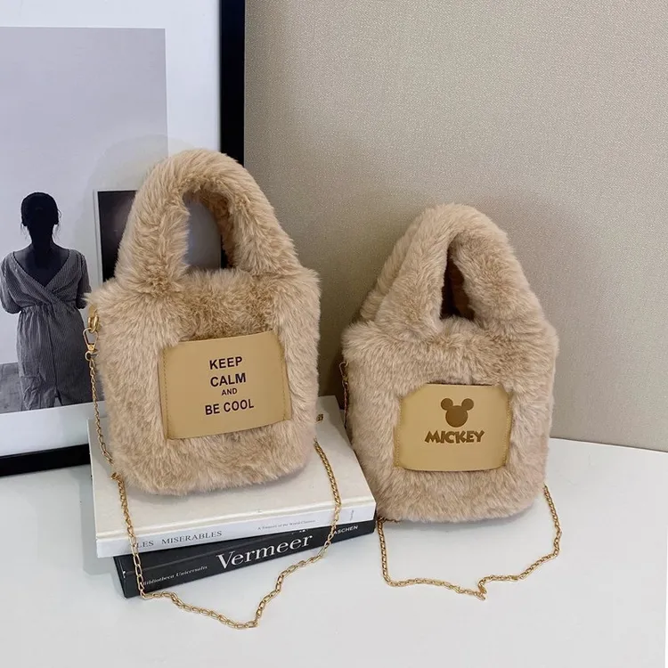 2025冬季毛茸茸单肩水桶包韩版ins链条斜挎包外贸手提毛绒包包女