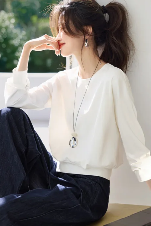 蔻菲图2025新款秋季女士白色薄款长袖衬衫休闲百搭设计感下摆开叉
