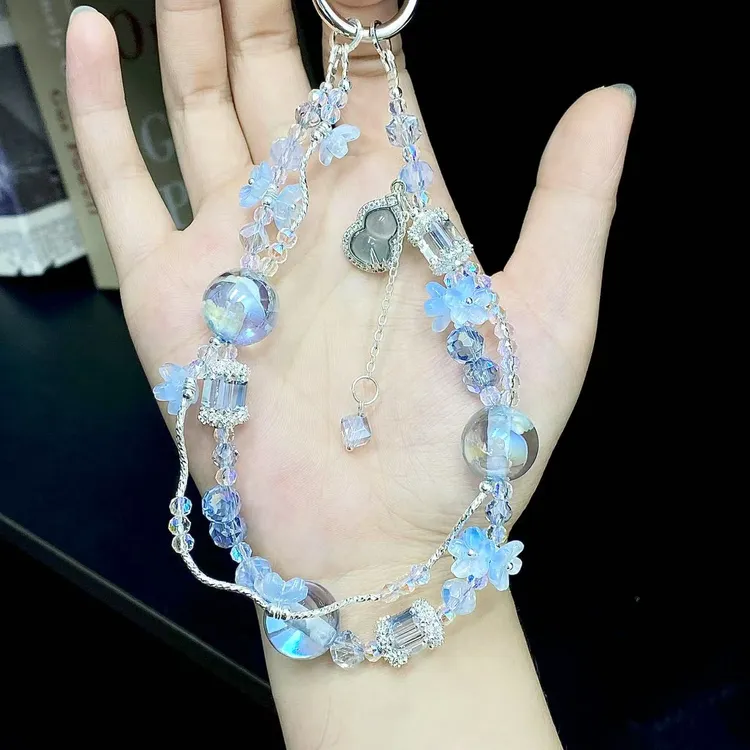 手机链女款爆款2025新款高级感手机挂链耳机包包挂件手腕款带垫片