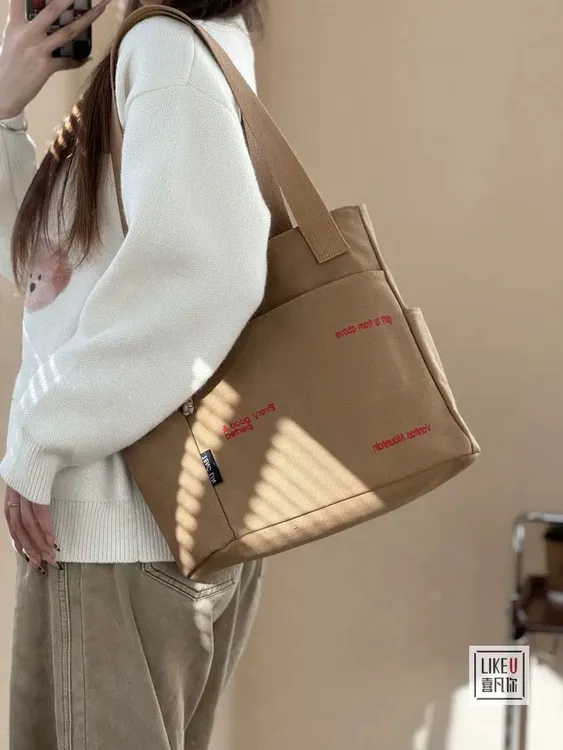 时尚大容量包包女大学生上课手提布袋上班帆布单肩通勤托特妈咪包