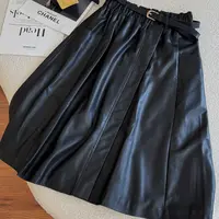 斜裁立体口袋松紧腰显瘦A字半身皮裙