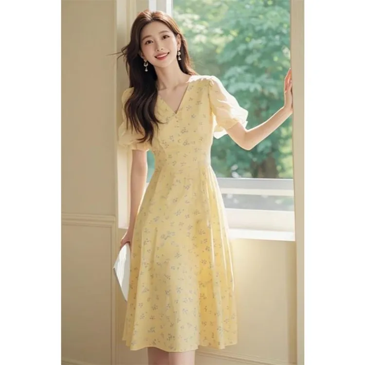 温柔女装2025夏季时尚简单大方桔梗法式气质修身黄色碎花连衣裙女