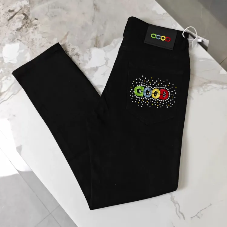 网红同款烫钻字母Good新潮牌黑色牛仔裤修身时尚帅气百搭小直筒裤