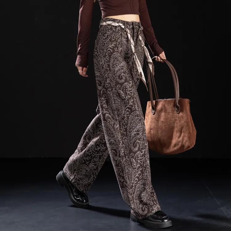 老钱风腰果花咖啡色加绒牛仔裤女2025新款加厚弯刀裤阔腿裤镰刀裤