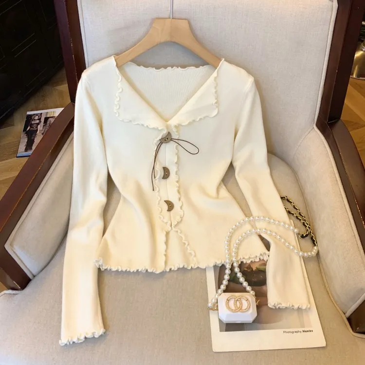 减龄木耳边V领长袖针织衫女2025年秋冬新款时尚高级感不规则上衣
