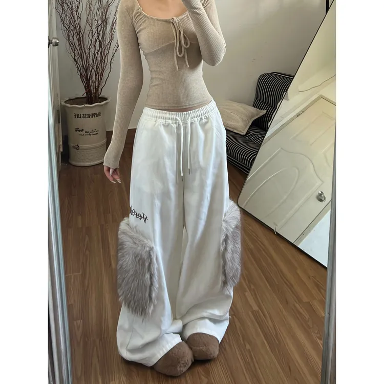 简约白色毛绒拼接牛仔裤裤子女款2026春季新款高腰宽松休闲阔腿裤