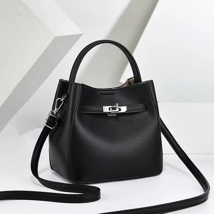 YUSHA/高档黑色小C牛皮极简风手提水桶包-96138