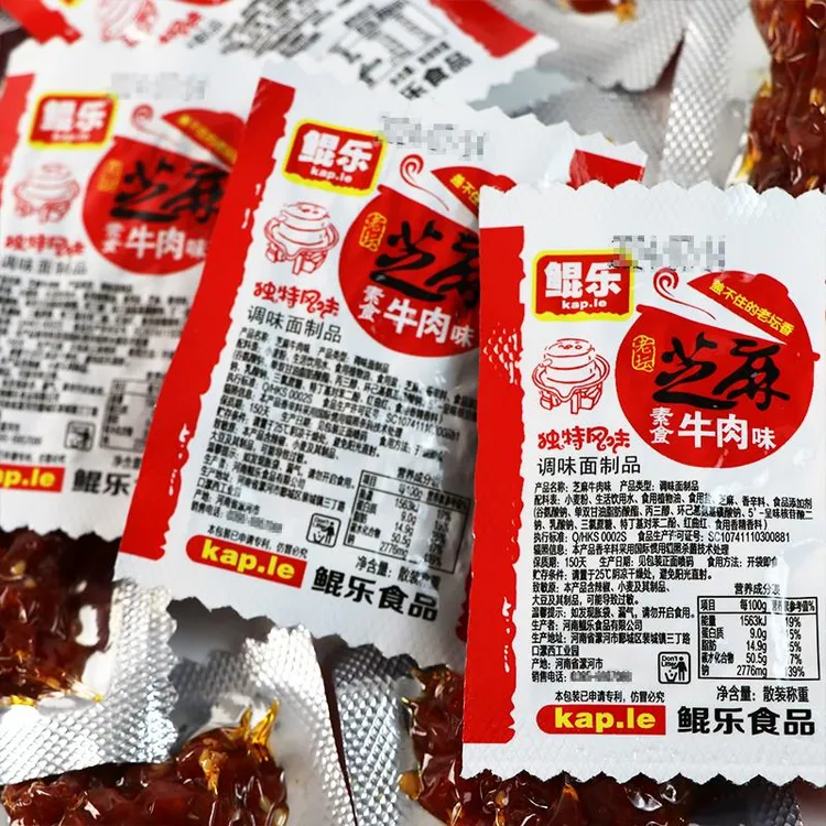 鲲乐炭烤芝麻素牛肉辣条素牛肉粒麻辣香辣素食面筋儿时怀旧小零食