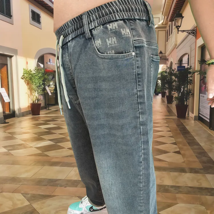 秋季新款男士大码宽松水洗高弹力小脚牛仔裤韩系百搭牛仔裤300斤