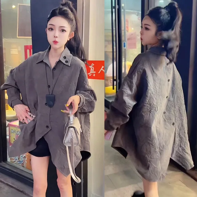 2025年春秋新款慵懒风不规则斜扣翻领衬衫时尚潮流百搭宽松外套女