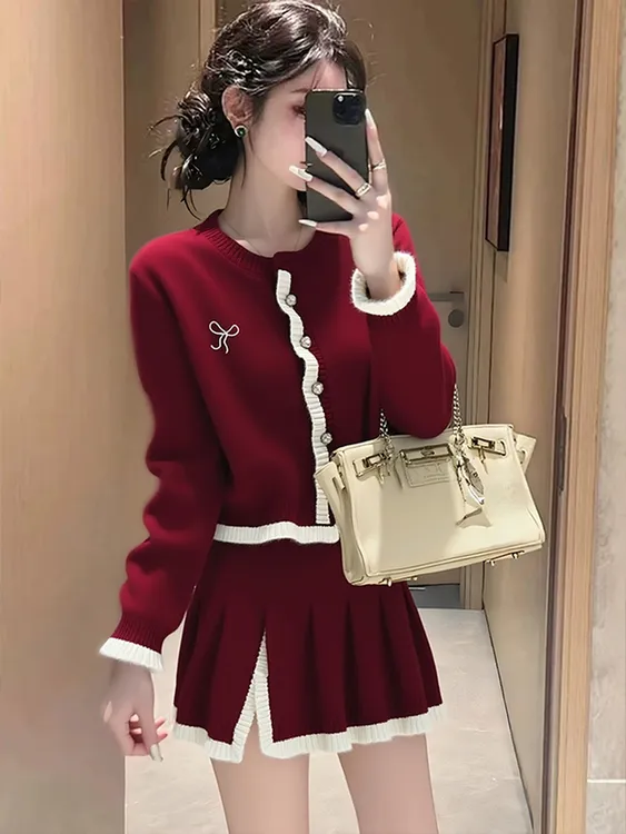 温柔圣诞撞色拼接木耳边毛衣女秋冬新款温柔风减龄显瘦针织衫上衣