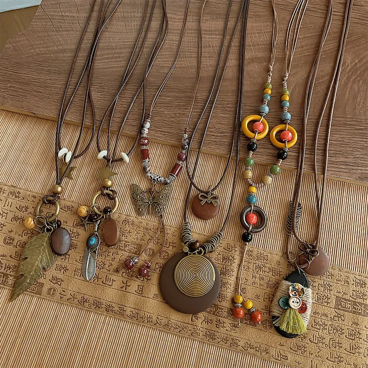 新中式禅意羽毛吊坠项链女复古叠戴配饰波西米亚长款颈链锁骨链