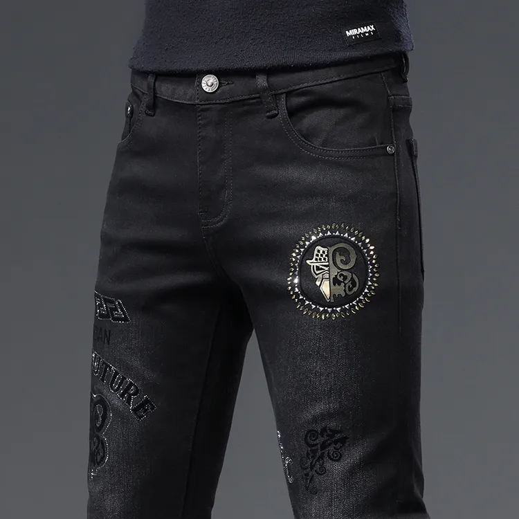 KEMPOTIWON冬季黑色牛仔裤男修身小脚刺绣烫钻潮牌男个性痞帅潮流