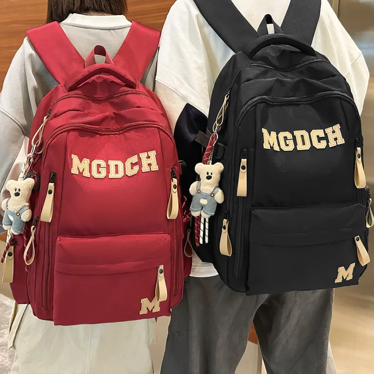 减负护脊大容量初中生书包女高中生防滑扣双肩包男大学生旅游背包