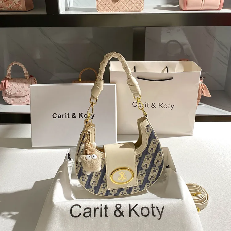 CARIT KOTY撞色牛仔蓝新月腋下包包女2025新款百搭单肩月牙包斜挎