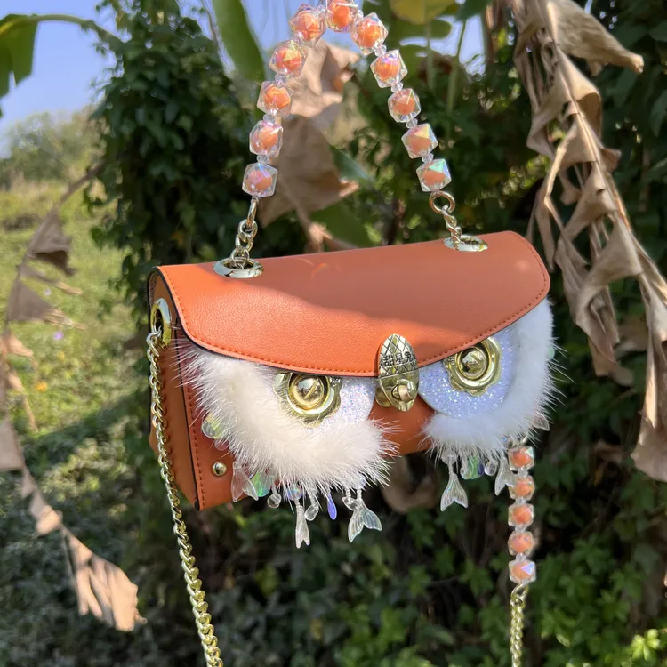 新款橙色换脸包时尚轻奢设计师单肩斜挎女包通勤百搭小方包